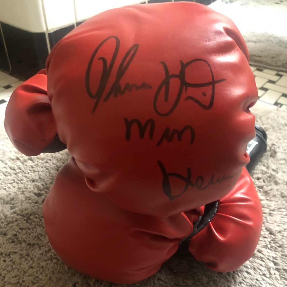 Boxing Gloves signed by Tommy The Hitman Hearns.